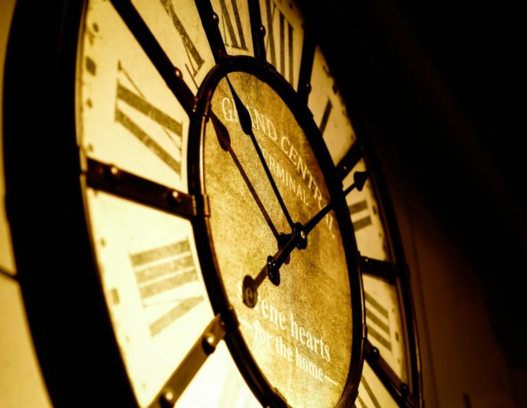 black and white analog clock